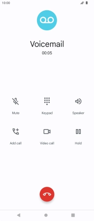 Press the end call icon.