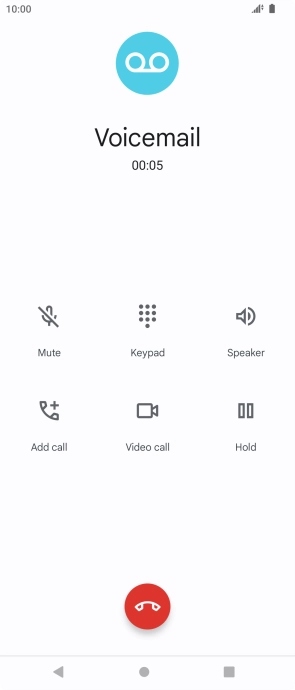 Press the end call icon.