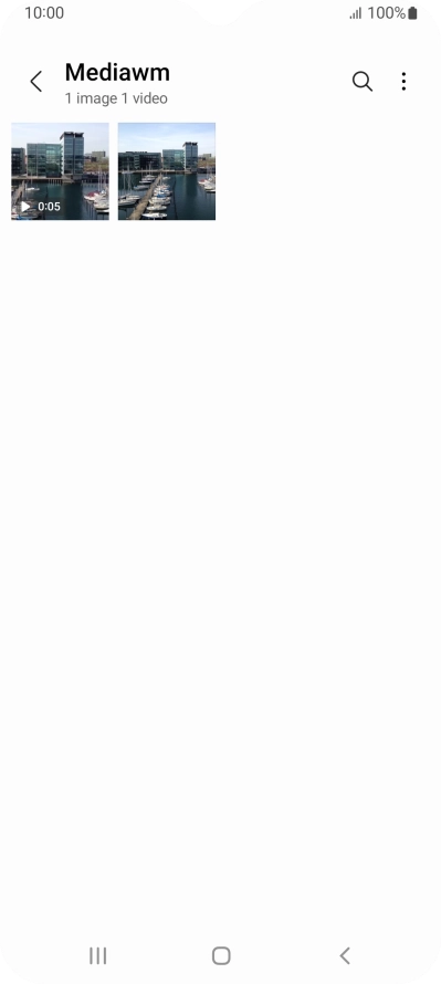 Press and hold the required picture or video clip. Press and hold the required picture or video clip.