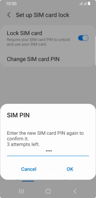 Key in the new PIN again and press OK.