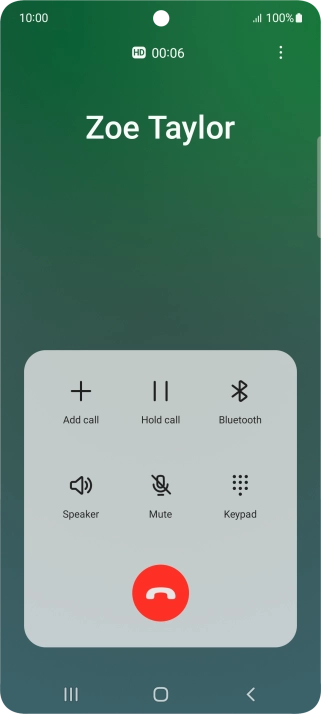 Press the end call icon.
