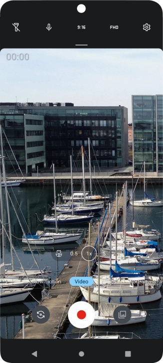 If the video recorder is turned on, press Photo.