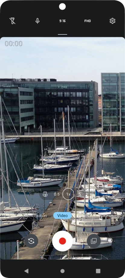 If the video recorder is turned on, press Photo.