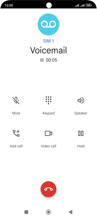 Press the end call icon.
