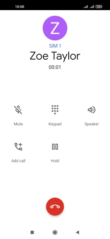 Press the end call icon.