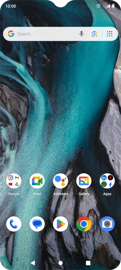 The alarm icon shows that the alarm is set.