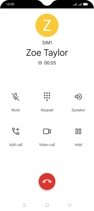 Press the end call icon.