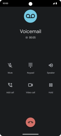 Press the end call icon.
