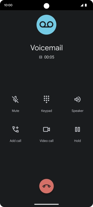 Press the end call icon.