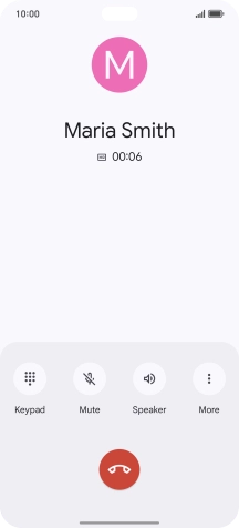 Press the end call icon.