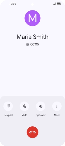 Press the end call icon.