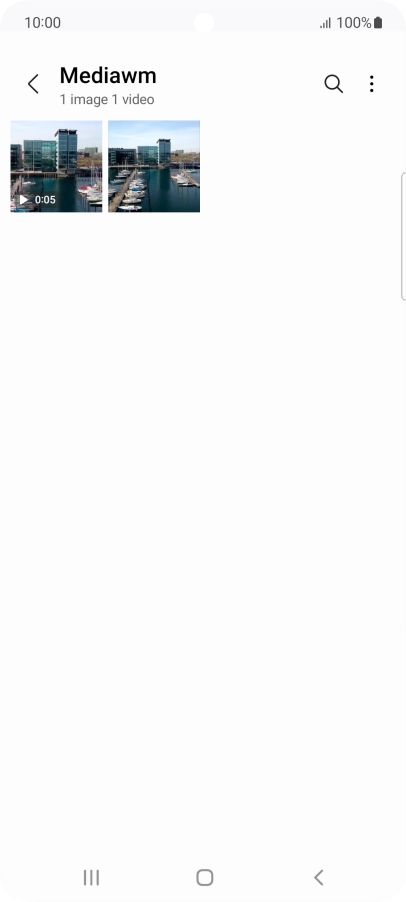 Press and hold the required picture or video clip. Press and hold the required picture or video clip.