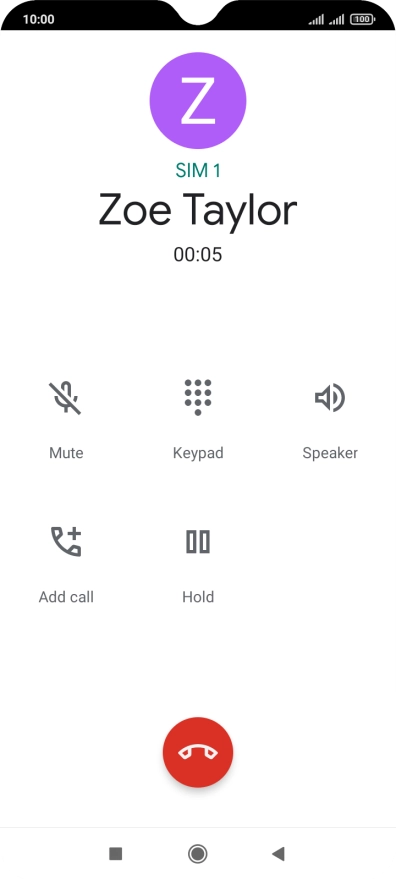 Press the end call icon.