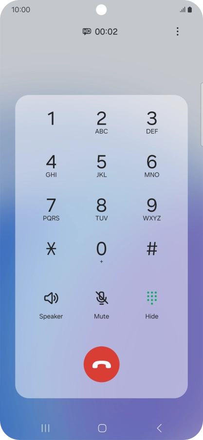 Press the end call icon.