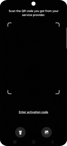 Place the QR code you've received inside the phone camera frame to scan the code. Your eSIM is transferred to your new phone over the internet.