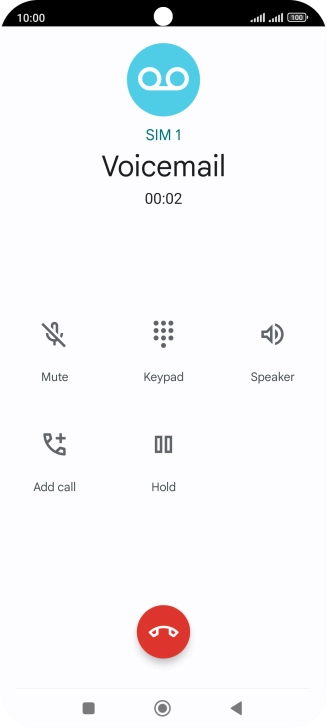 Press the end call icon.