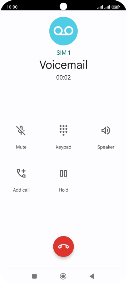 Press the end call icon.