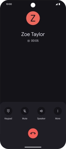 Press the end call icon.