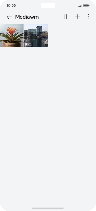 Press and hold any picture or video.