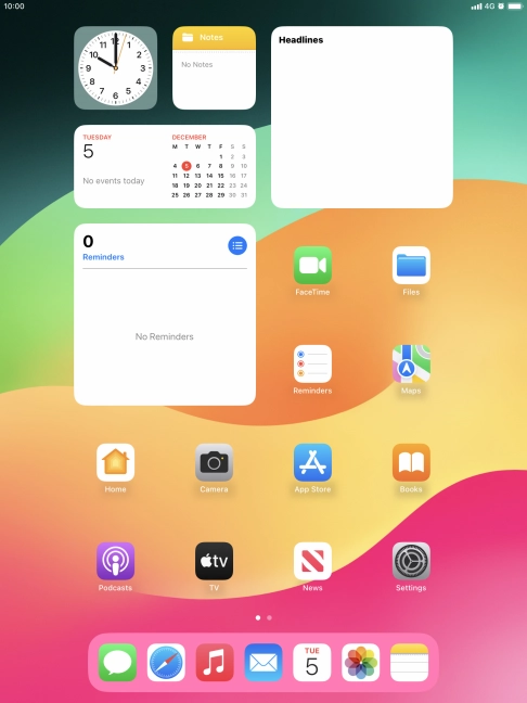 The alarm icon shows that the alarm is set.