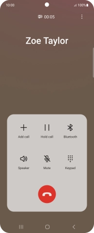 Press the end call icon.