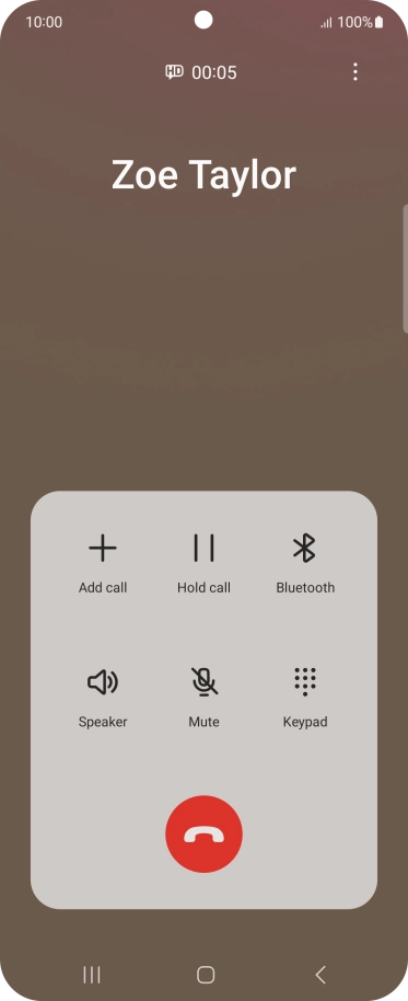 Press the end call icon.