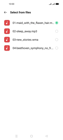 Once you've found a ring tone you like, press the Return key.