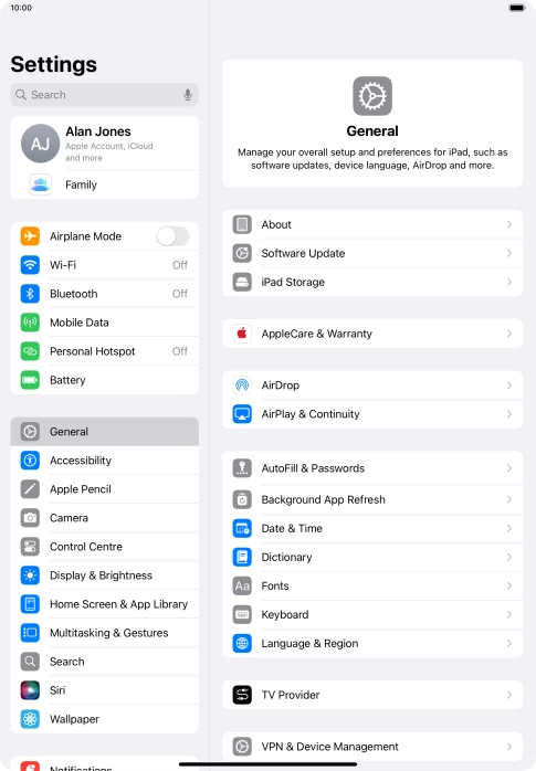 Press your Apple ID. Press your Apple ID.
