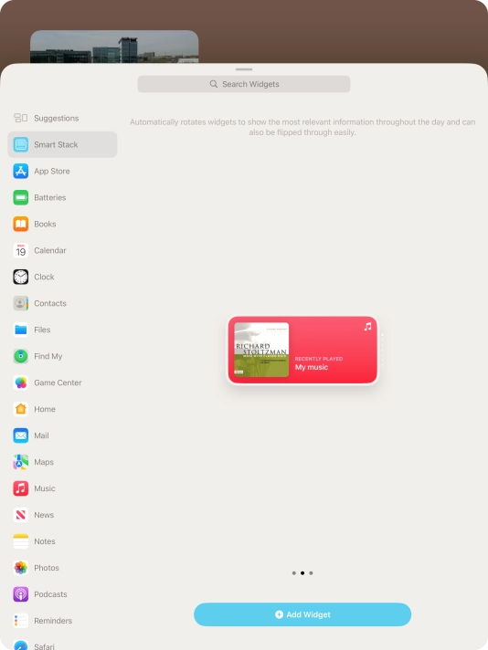 Slide your finger right or left on the screen to select the required widget size.