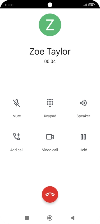 Press the end call icon.