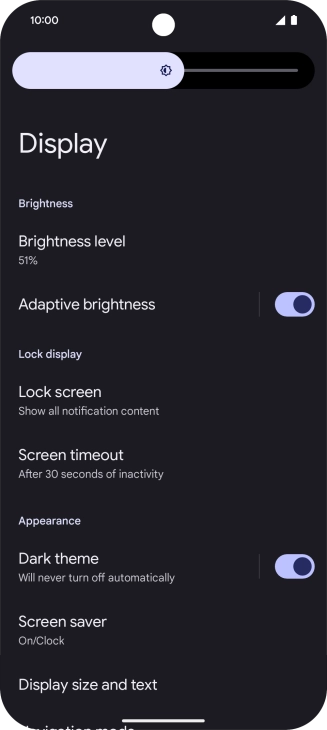 Drag the indicator right or left to set the brightness manually.