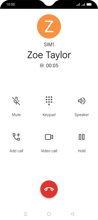 Press the end call icon.