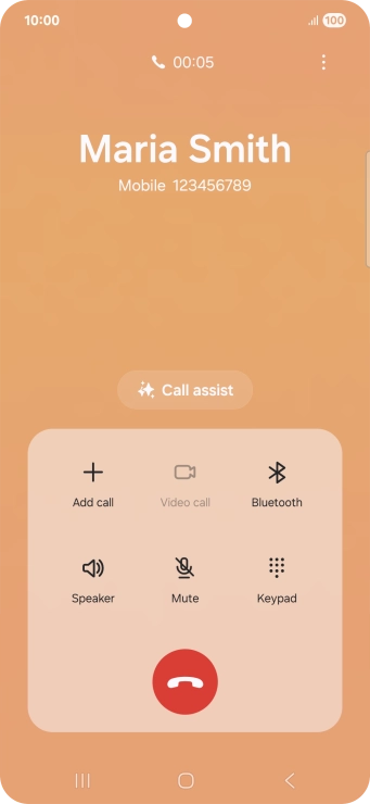Press the end call icon.