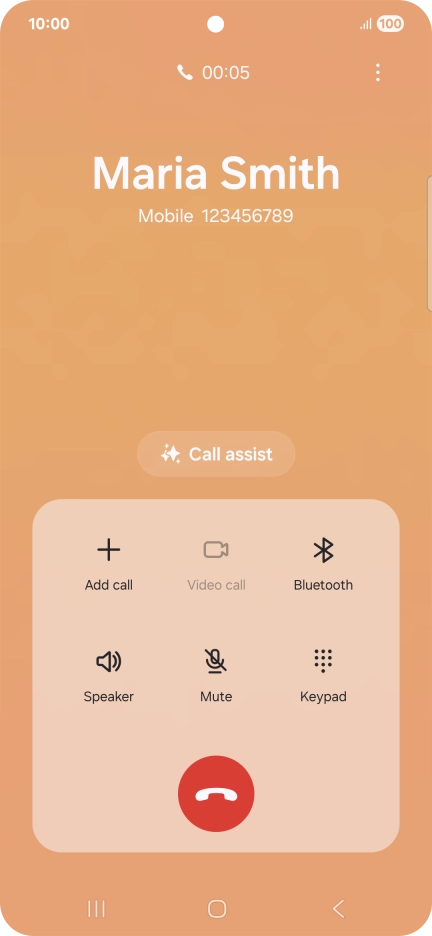 Press the end call icon.