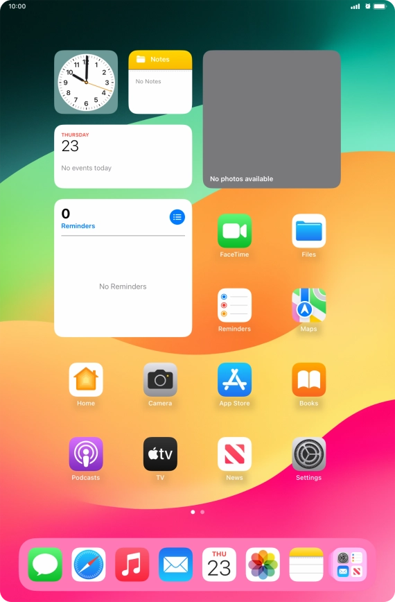 The alarm icon shows that the alarm is set.