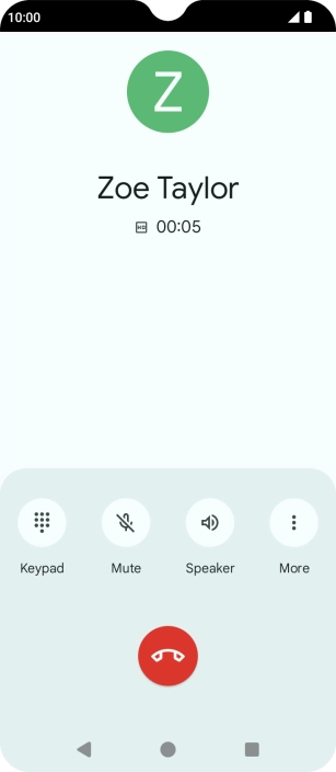 Press the end call icon.