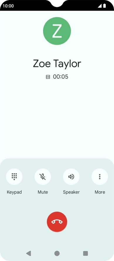 Press the end call icon.