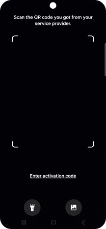 Place the QR code you've received inside the phone camera frame to scan the code. Your eSIM is transferred to your new phone over the internet.