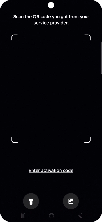 Place the QR code you've received inside the phone camera frame to scan the code. Your eSIM is transferred to your new phone over the internet.