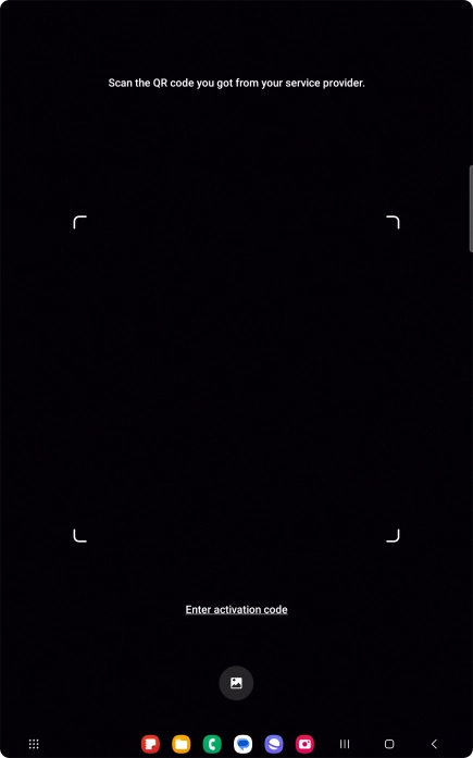 Place the QR code you've received inside the tablet camera frame to scan the code. Your eSIM is transferred to your new tablet over the internet.