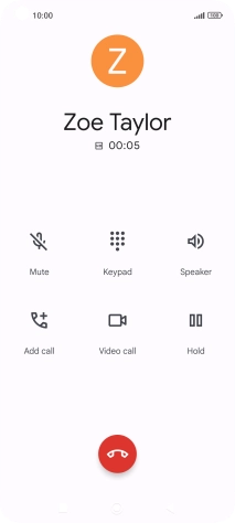 Press the end call icon.