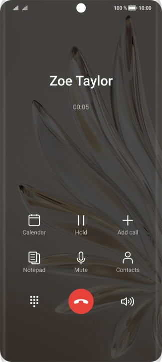 Press the end call icon.