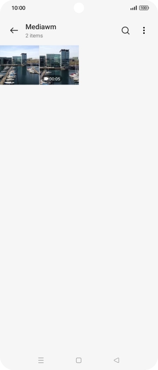 Press and hold any picture or video clip. Press and hold any picture or video clip.