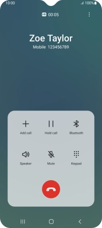 Press the end call icon.