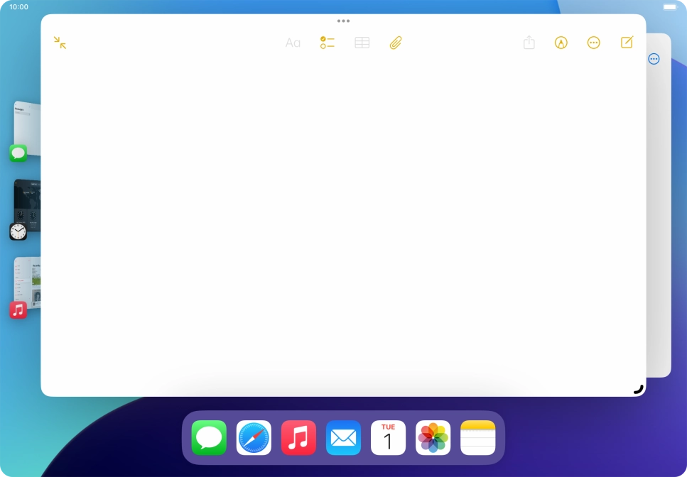 Press the required application in Dock and drag it to the required location on the screen.