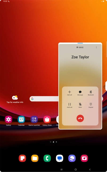 Press the end call icon.