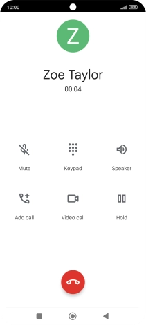 Press the end call icon.