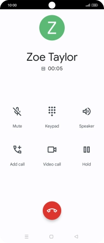 Press the end call icon.