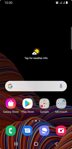 The alarm icon shows that the alarm is set.