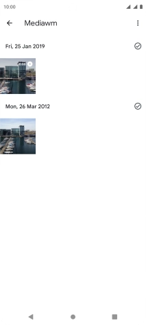 Press and hold any picture or video clip.